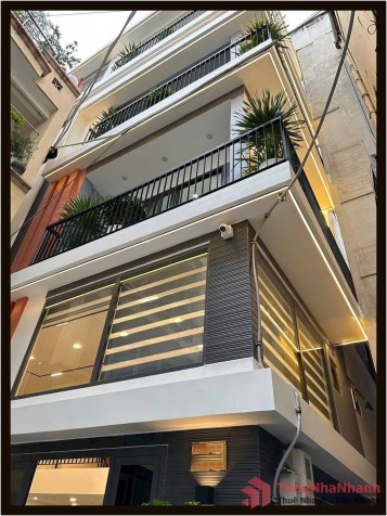 Top nhà vị trí đẹp 7.5 x 10.5m 1 trệt 5 lầu thang máy Tôn Thất Tùng Q1 TP.HCM